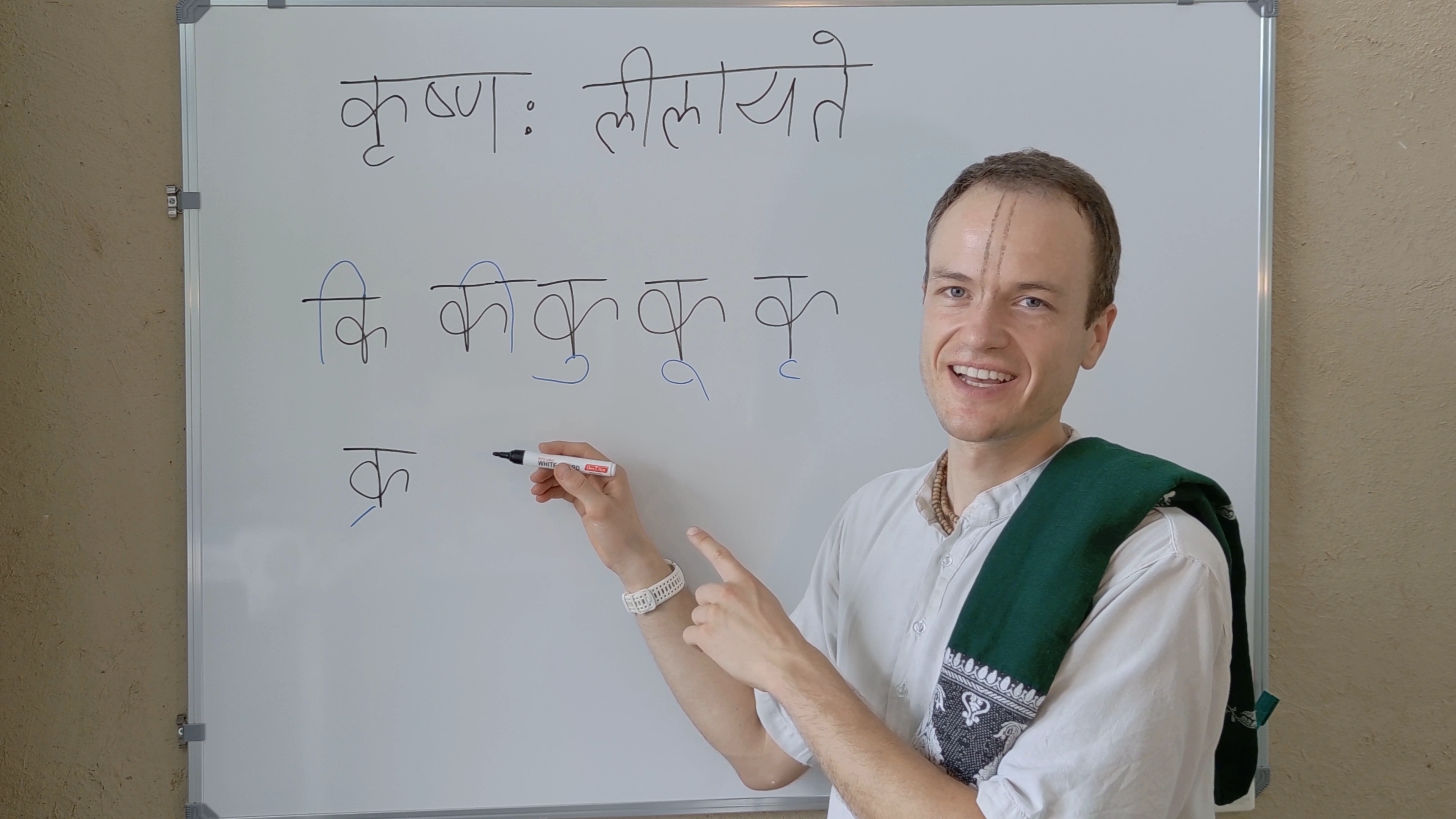 Vilasa teaching on the whiteboard